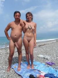 Dad's huge cock is always hard with his girl on nude beach