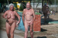 Grandma with huge flabby tits and hairy pussy walking along with grandpa with big saggy balls and shaved dick