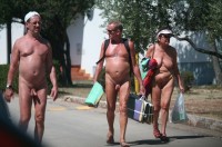 Grandpa with uncut shaved penis walking at nudist camp with grandma's big flabby tits and shaved twat