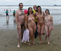 Happy nudist group with guy's small hairy dick and girls with small and big tits and trimmed cunts