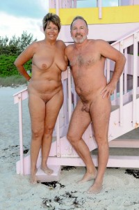 Middle age couple proudly posing nude and showing guy's small uncut dick and woman's flabby tits and shaved cunt