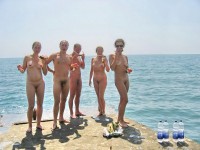 Nudist family showing small and big dicks and small breasts and trimmed pussies