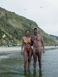 Older nudist couple posing nude with male's fat cut hairy dick and female's saggy tits and trimmed pussy