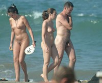 Walking on a nude beach and showing my tiny little hairy penis with my young wife with nice firm perky breasts and trimmed vagina