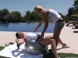 Lesbian babes exercise by the pool