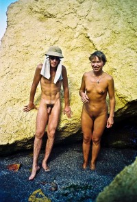 Guy with hairy uncut dick with big foreskin covering head with hat a posing with girl's trimmed cunt and tiny tits