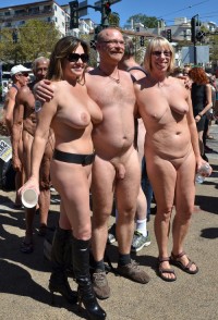 I like walking nude on a parade and proudly showing my uncut trimmed dick with my young friend with huge firm tits and shaved cunt and my old girlfriend with big fat twat and flabby tits