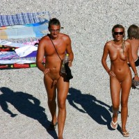 Nudist photo with husband's tiny long cock and wife with small tits and shaved vagina