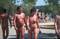 Older couple walking nude and showing guy's uncut shaved small cock and woman's flabby tits and shaved cunt