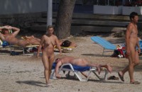 Older mom with nice saggy tits and trimmed cunt at a nude camp with her husband with tiny hairy cock