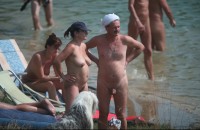 Some strange guy with tiny little shaved cock is looking around with his girlfriend's flabby tits and trimmed cunt