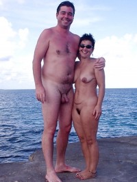 Tall guy on a beach with his small cock and big balls posing with my flabby tits and trimmed pussy