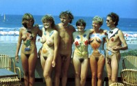 Whole naked family showing girls with huge hairy bushes and big firm tits and guys with tiny hairy cocks