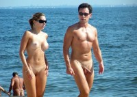 Young nudist couple with girl's firm tits and trimmed pussy and guy's almost hard thick dick