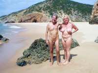 Young teen blonde girl with huge saggy tits and shaved pussy posing nude with some older man with soft cut dick