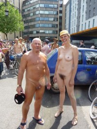 Younger girl with huge bushy pussy and firm tits looking at my tiny small shaved cock on public parade